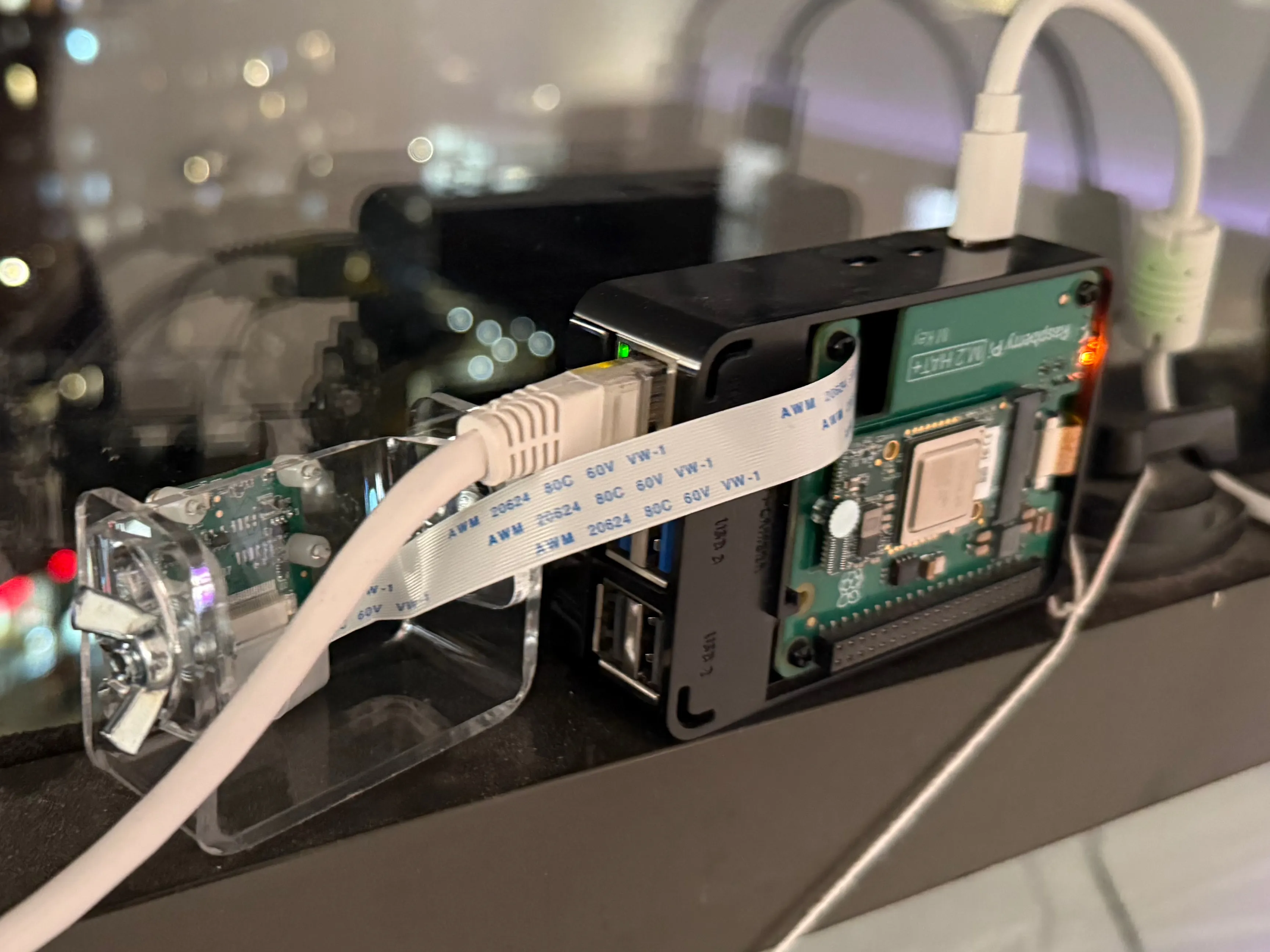 Traffi deployed in the window frame, this time the camera is on a plexiglass mount to hold it steady.